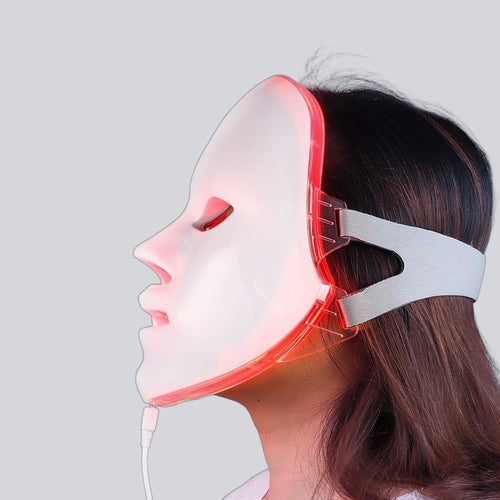 Woman wearing the LumeClear mask, side view